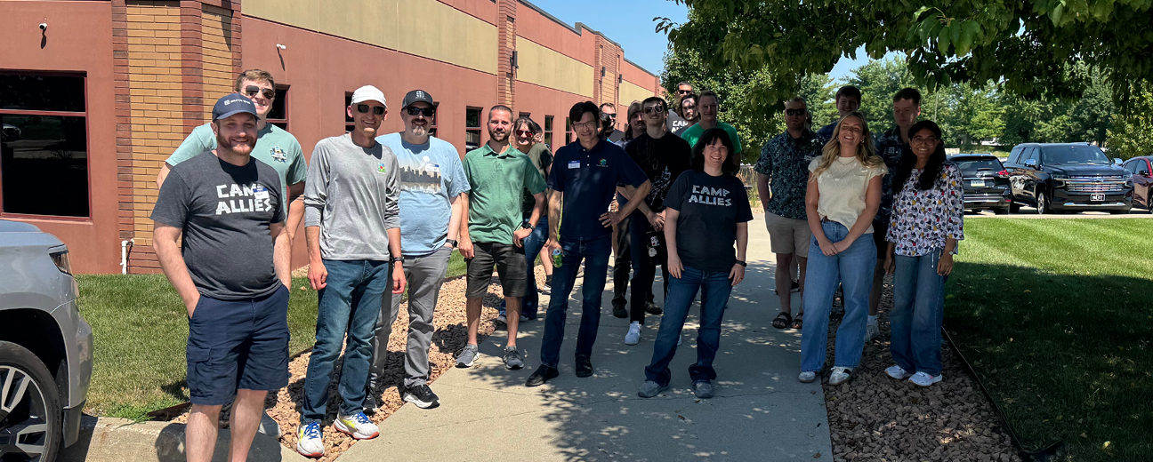 Source Allies teammates together at a company event