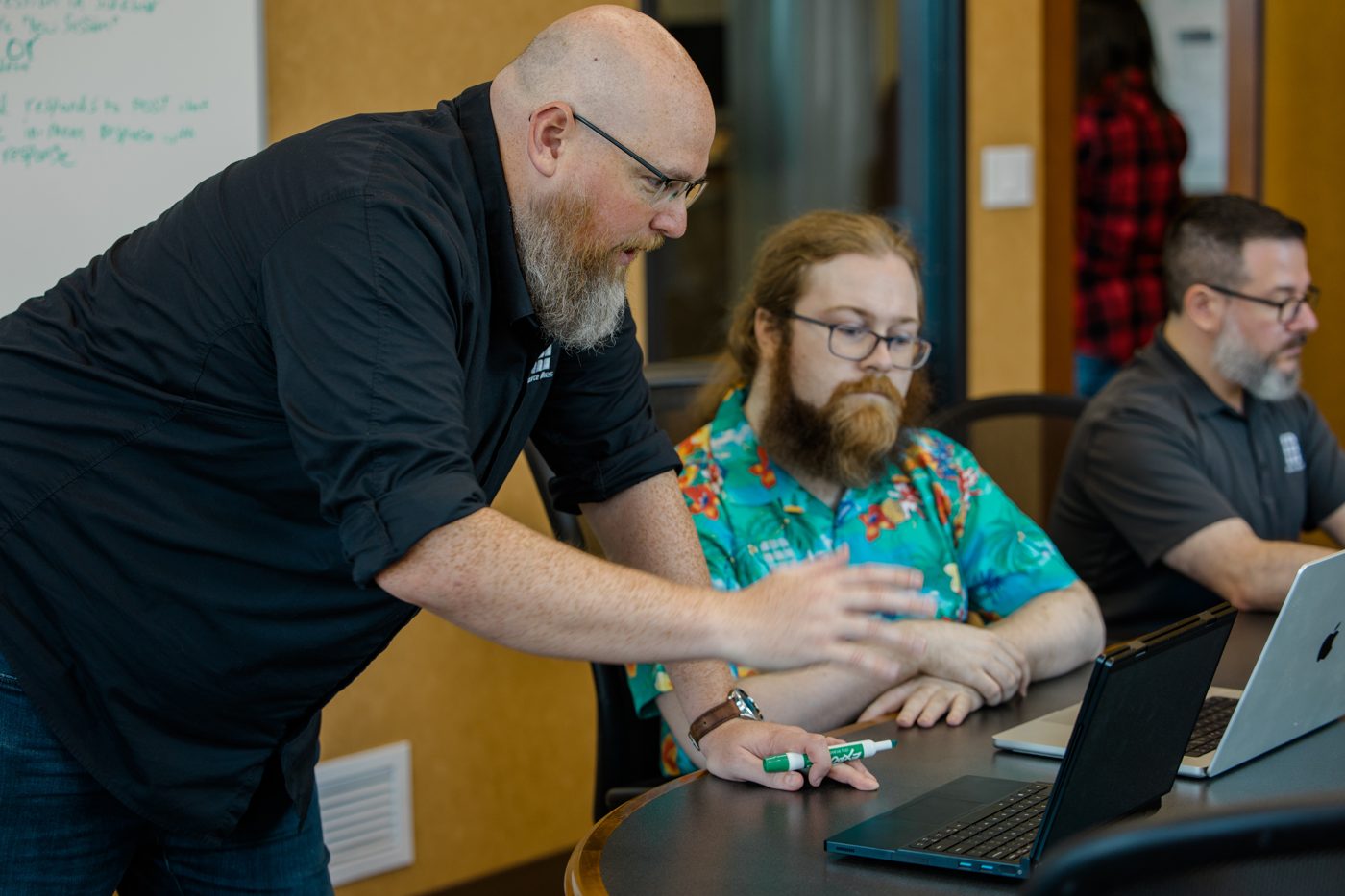Teammates collaborating on a software project