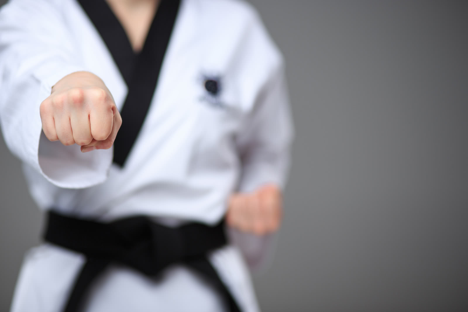 Martial artist demonstrating a punch in the air