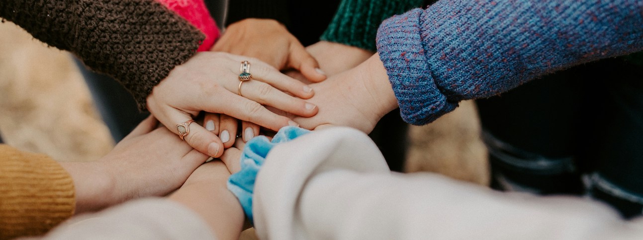 helping hands working together