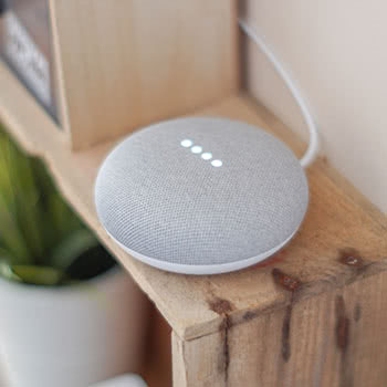 Home assistant device sitting on shelf